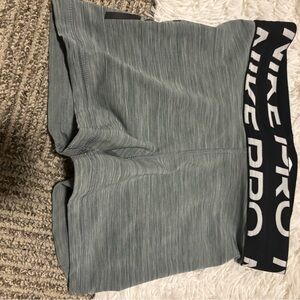 Extra small grey with black waist band Nike pro shorts